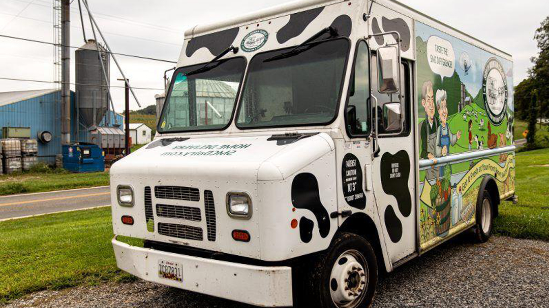 South Mountain Creamery Delivery Vehicle on farm in front of road