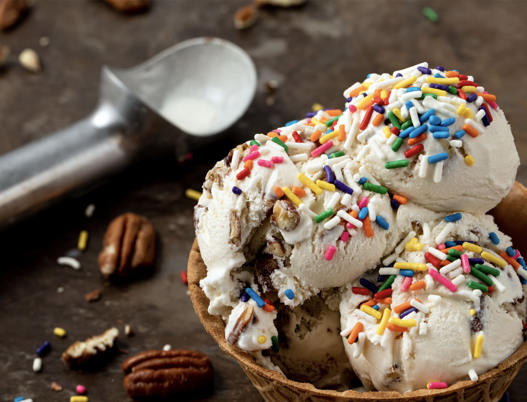 South Mountain Creamery Butter Pecan ice cream in a waffle bowl with sprinkles