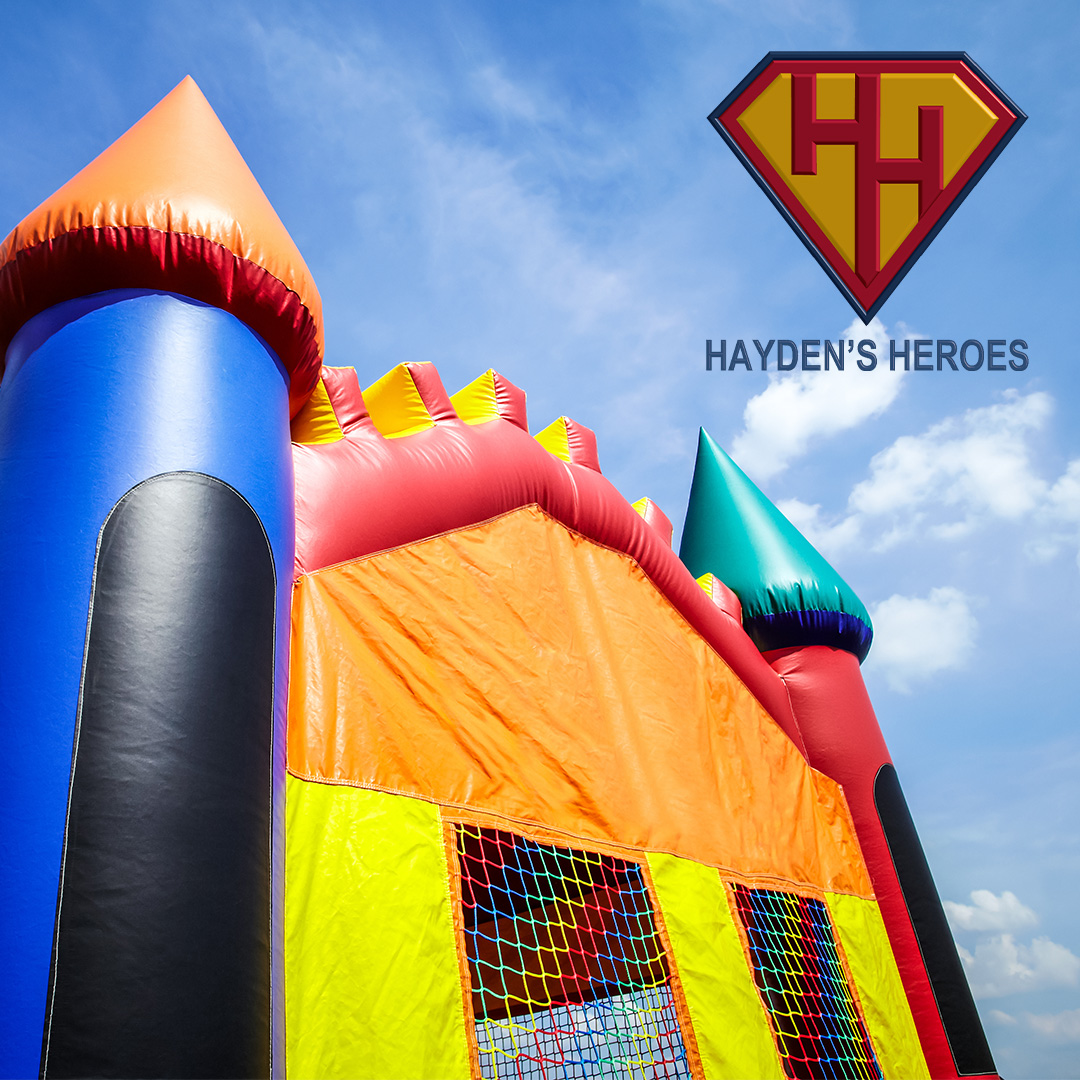 SMC-Hayden's-Heroes-7-25 Multicolored Easter eggs spill out of an Easter basket.