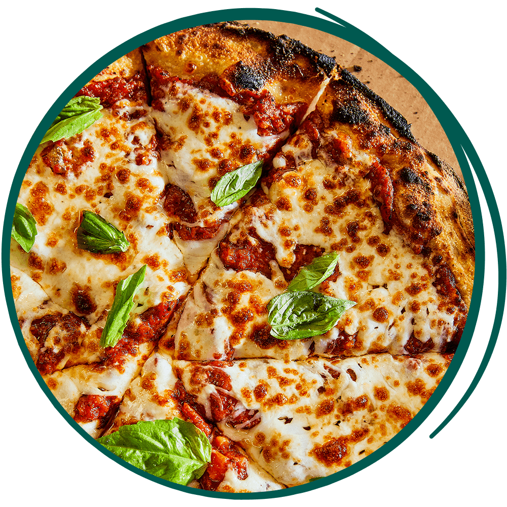 SMC-Website-Re-Skin-pizza-7-25 cheese pizza with fresh basil