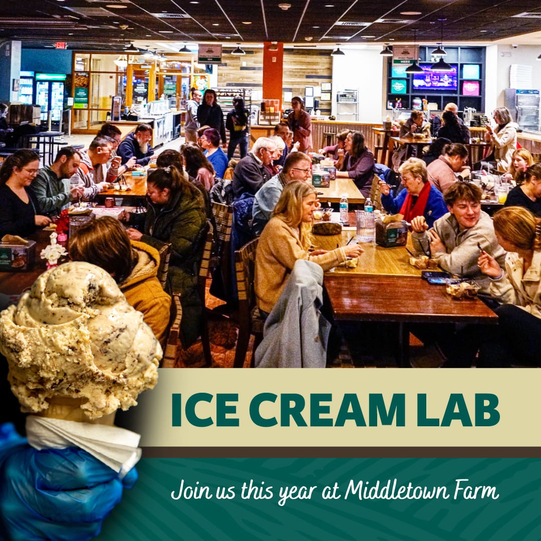 Multicolored Easter eggs spill out of an Easter basket.
